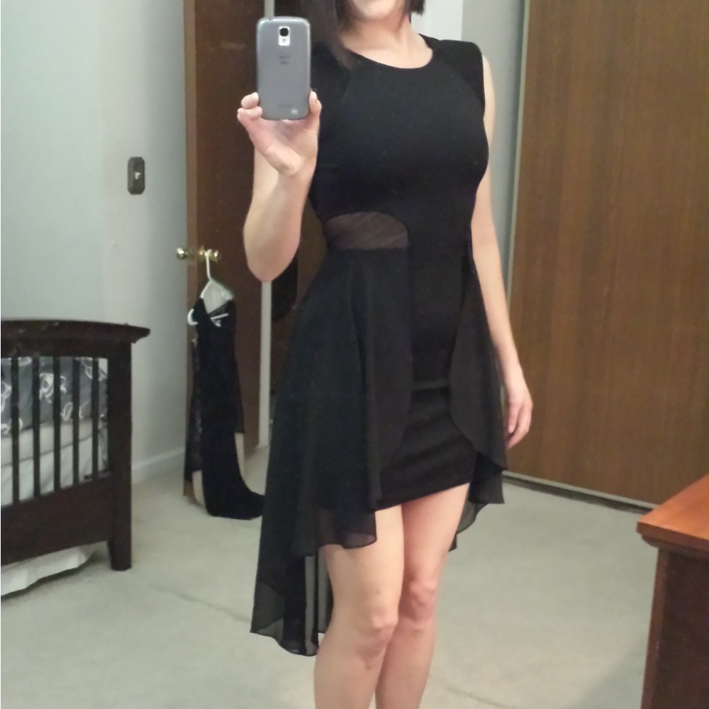 Bebe little black dress! This dress is absolutely stunning on.